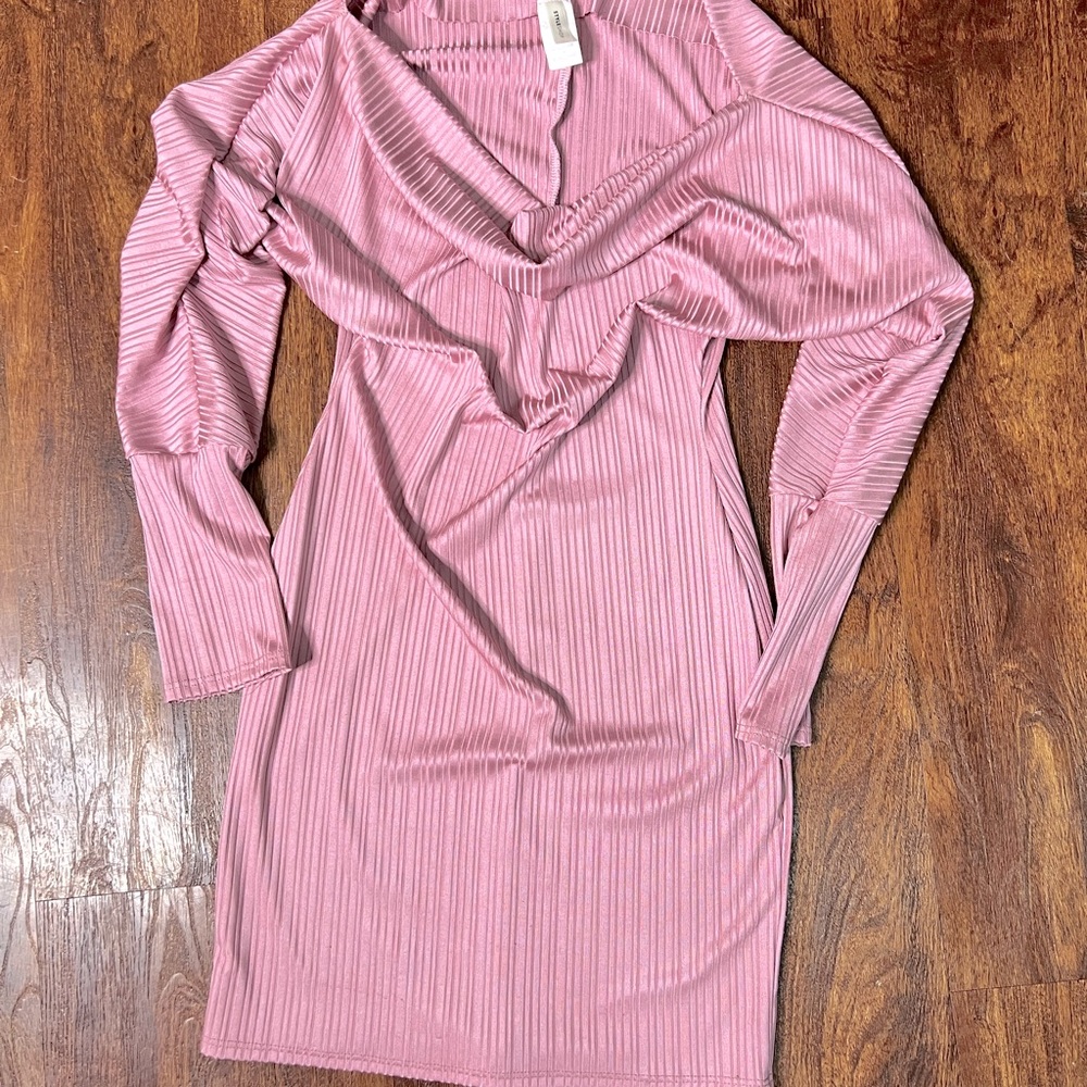 Polyester material. Pink polyester form fitting body con dress. Vertical stripe